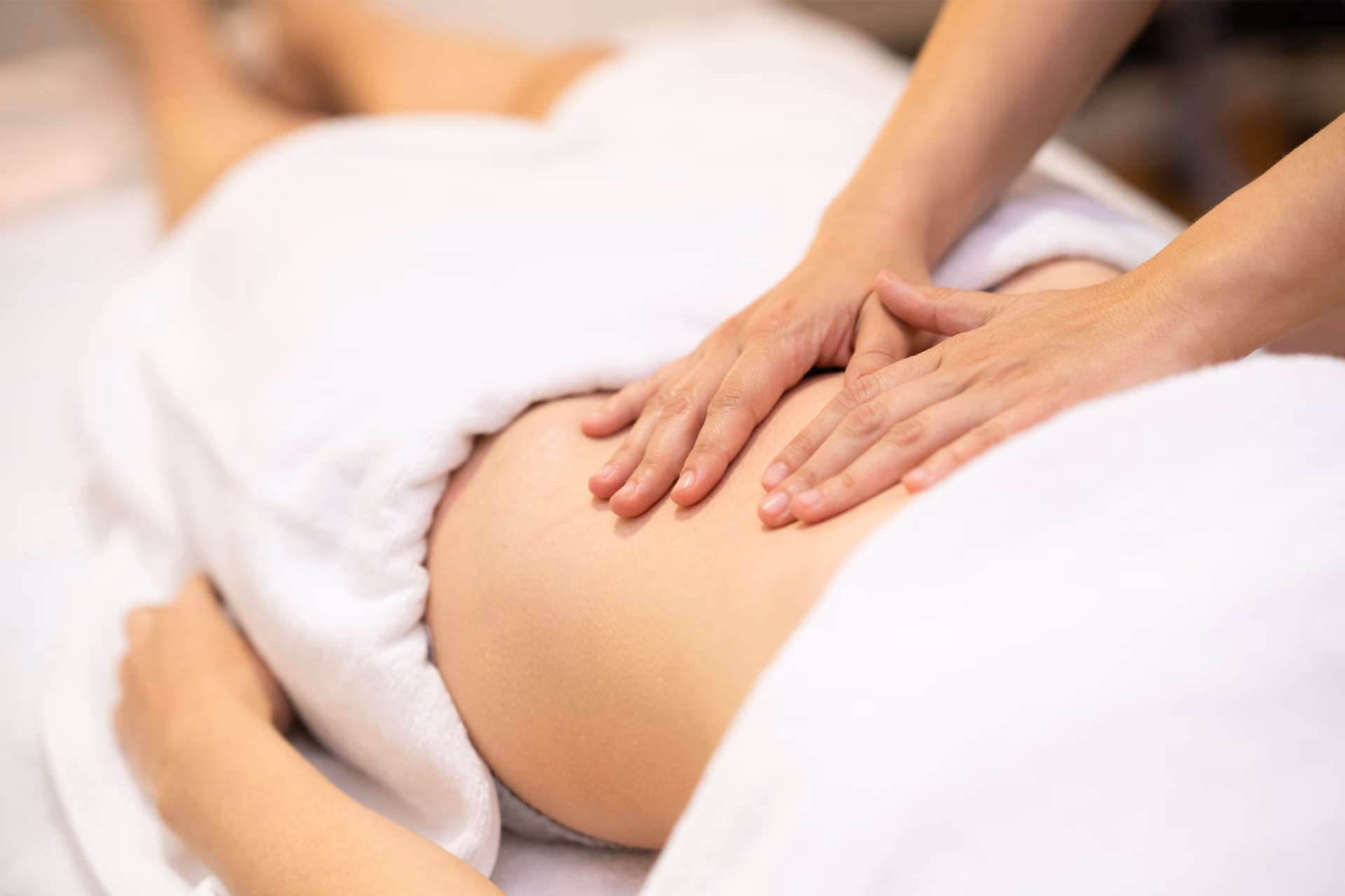 woman receiving a belly massage in a physiotherapy 2026 01 09 07 14 54 utc converted